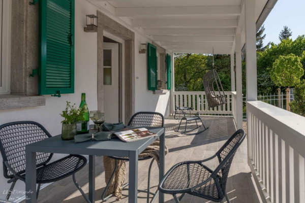 Auf der Veranda von Kaplogs Heischle